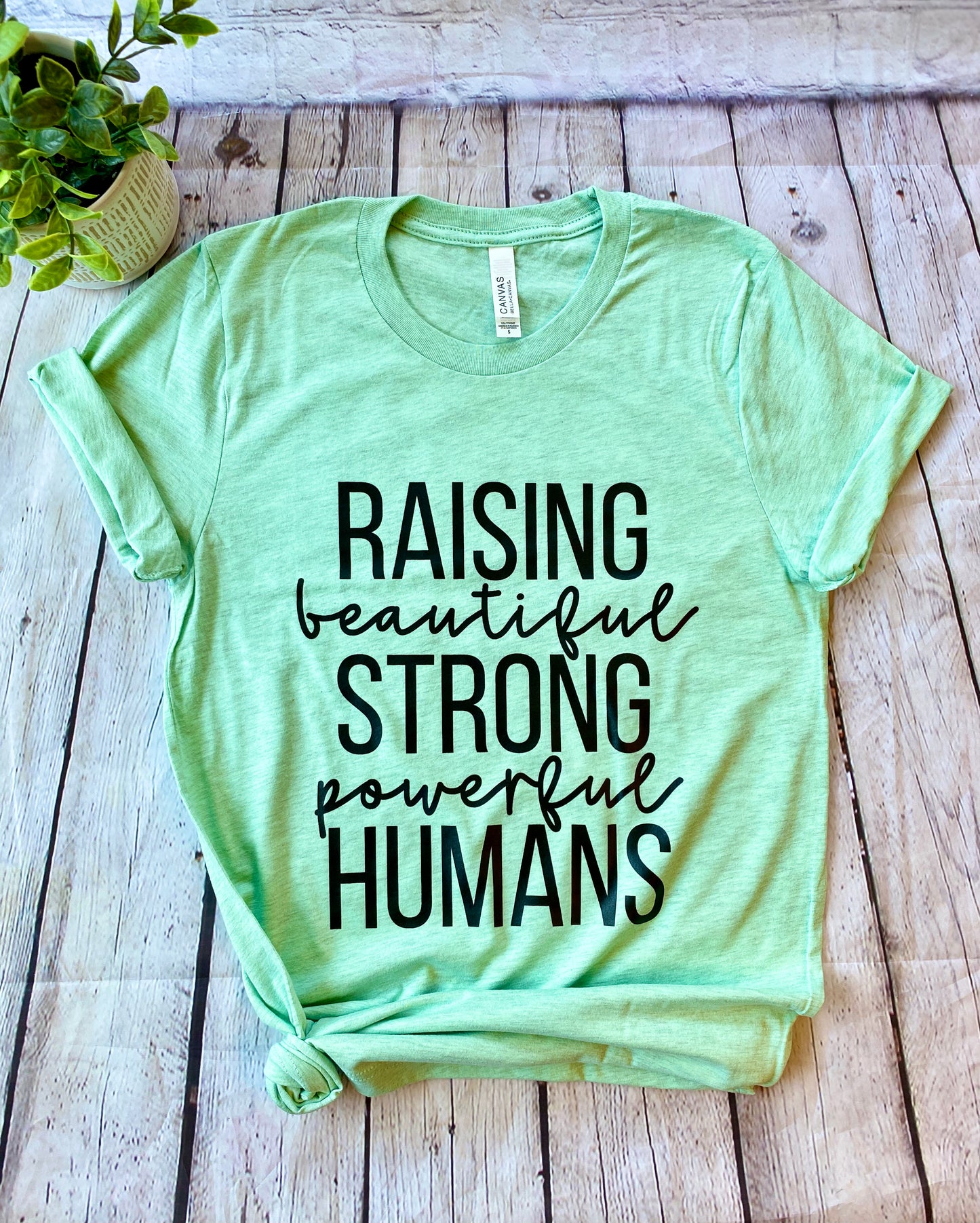 Raising beautiful, strong, powerful humans t-shirt